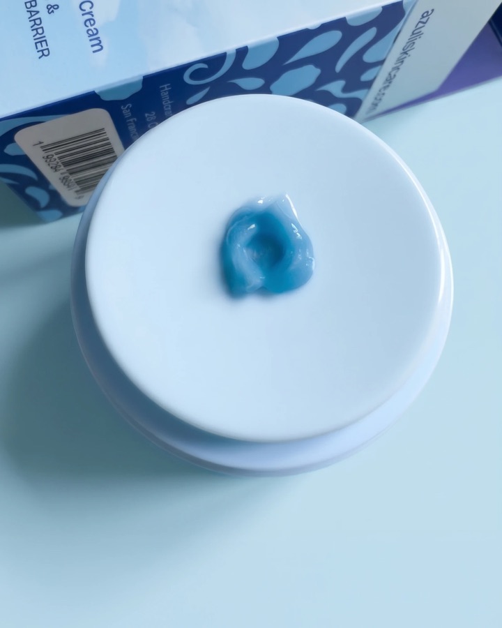 Top-down view of the pump with a single dollop of blue cream